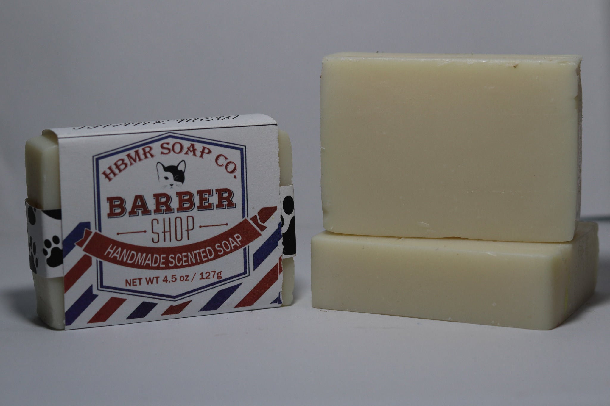 Barber soap with packaging on a gray background