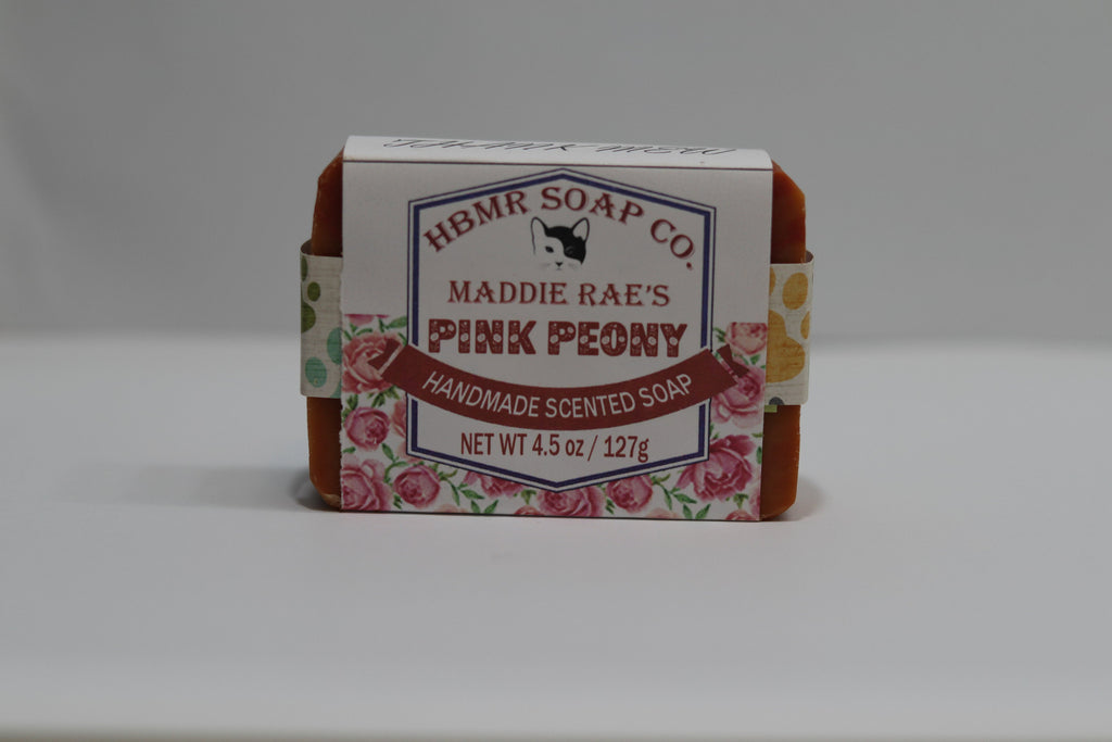 Handmade scented soap bar with packaging labeled 'HBMR Soap Co. Maddie Rae's Pink Peony' on a white background.