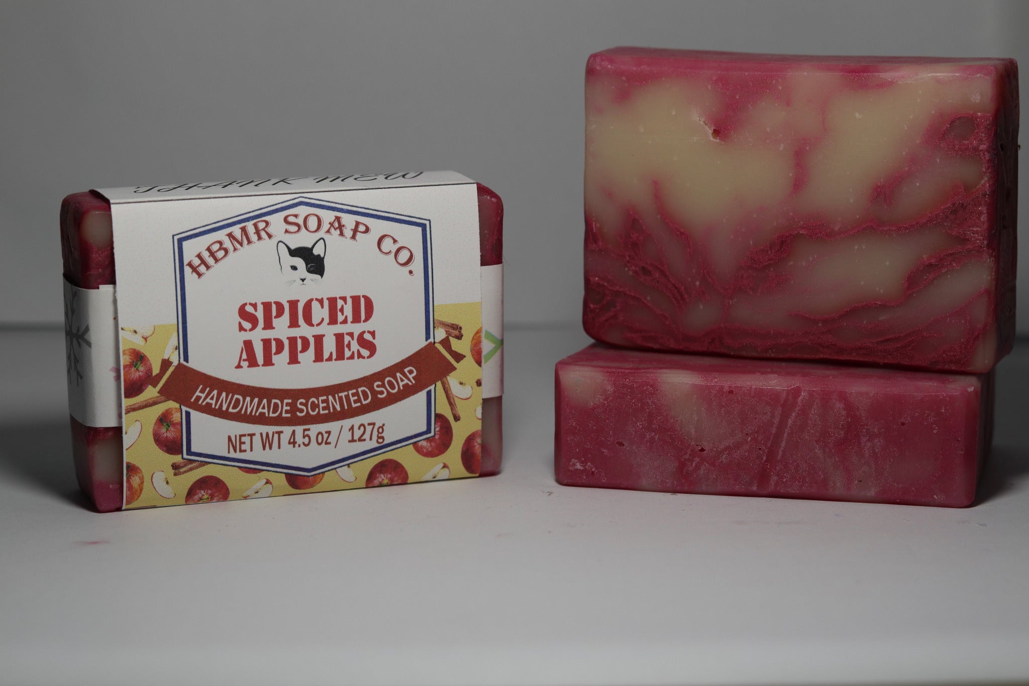 Spiced Apples soap bar and packaging on a gray background